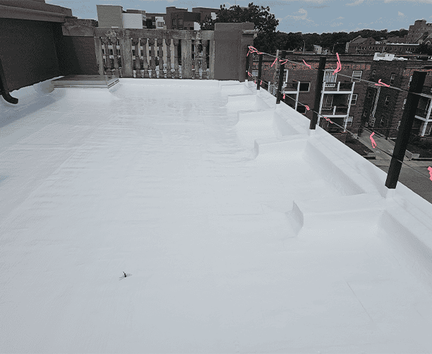 Flat Roof Coating Restoration Project.jpg