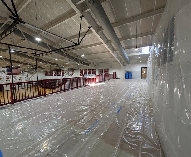 School Gym Roof Repair Protection Setup